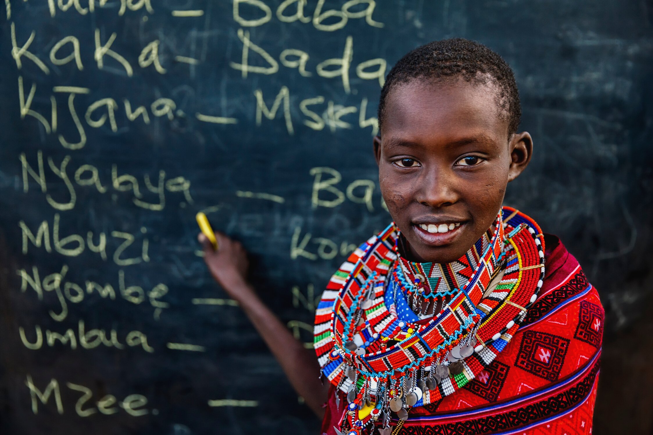 Little African girl during Swahili language class, East Africa